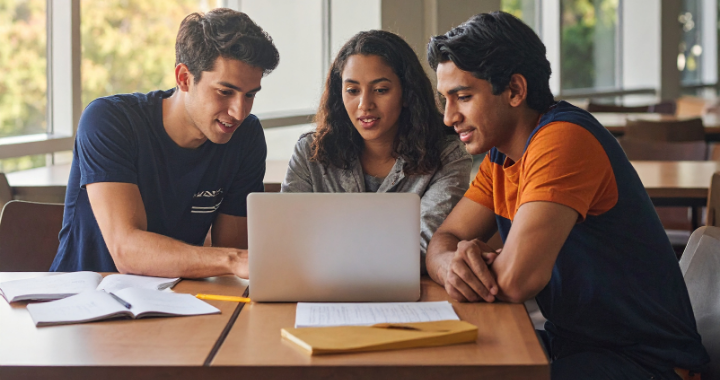 Three students building AI campus support.
